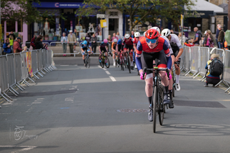 Cyclists competing in town centre cycle race.