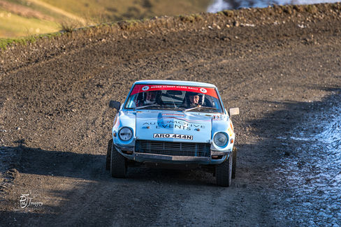 Datsun 240z rally car competing on Roger Albert Clark rally Sweetlamb special stage