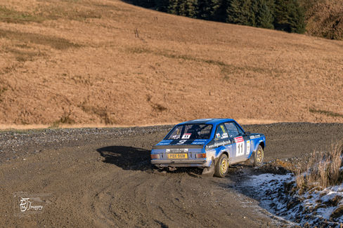 Ford Escort Rally car on gravel track competing on 2025 Roger Albert Clark Rally Sweetlamb special stage Wales.