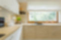 modern-kitchen-with-wooden-cabinets-PL6LTEV-scaled.jpg