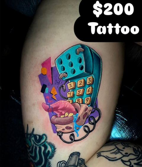 Colorful Freddy Krueger phone tattoo inspired by A Nightmare on Elm Street, created by tattoo artist Frank Miller.
