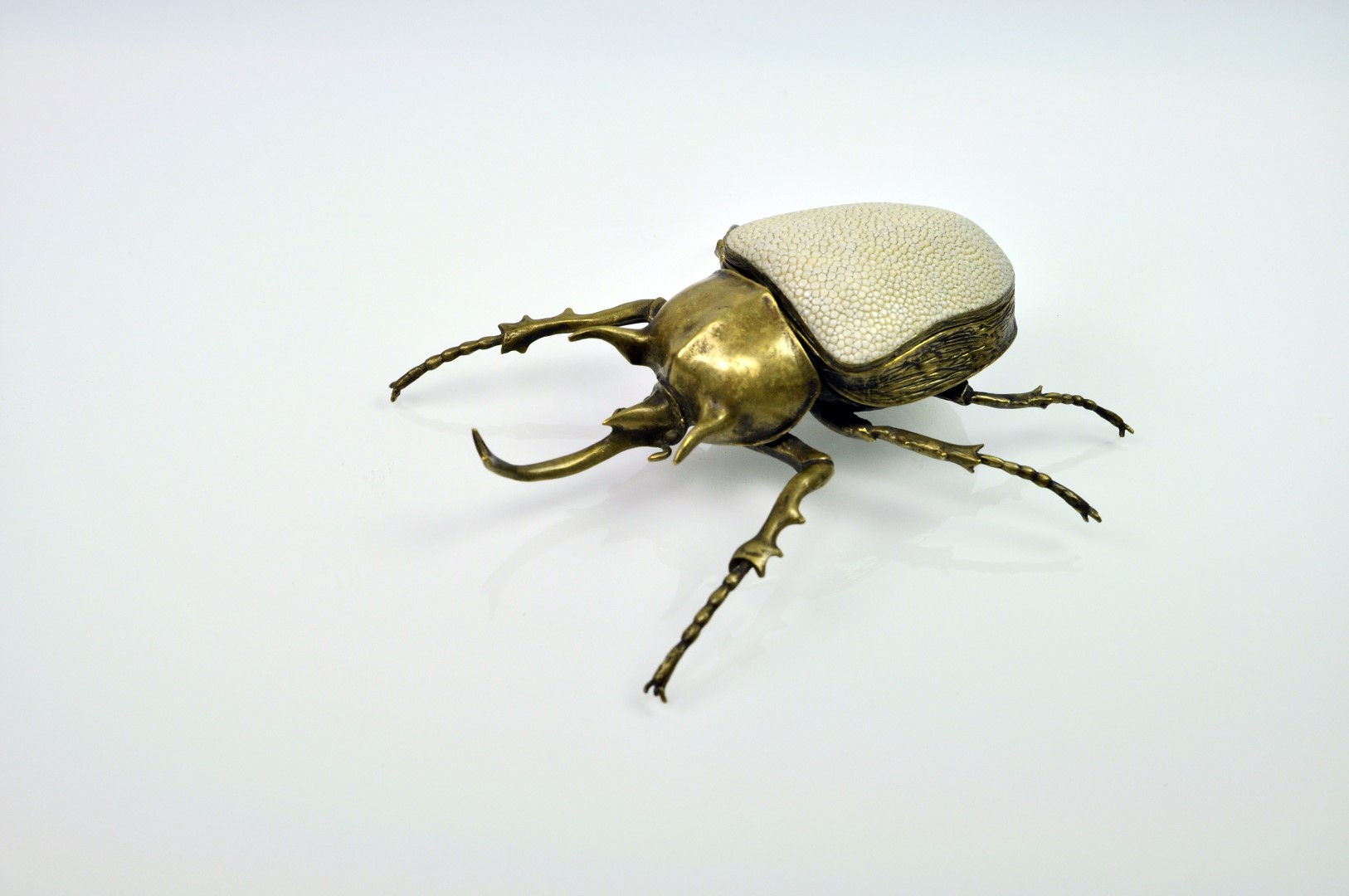 brass scarab box with a shagreen lid
