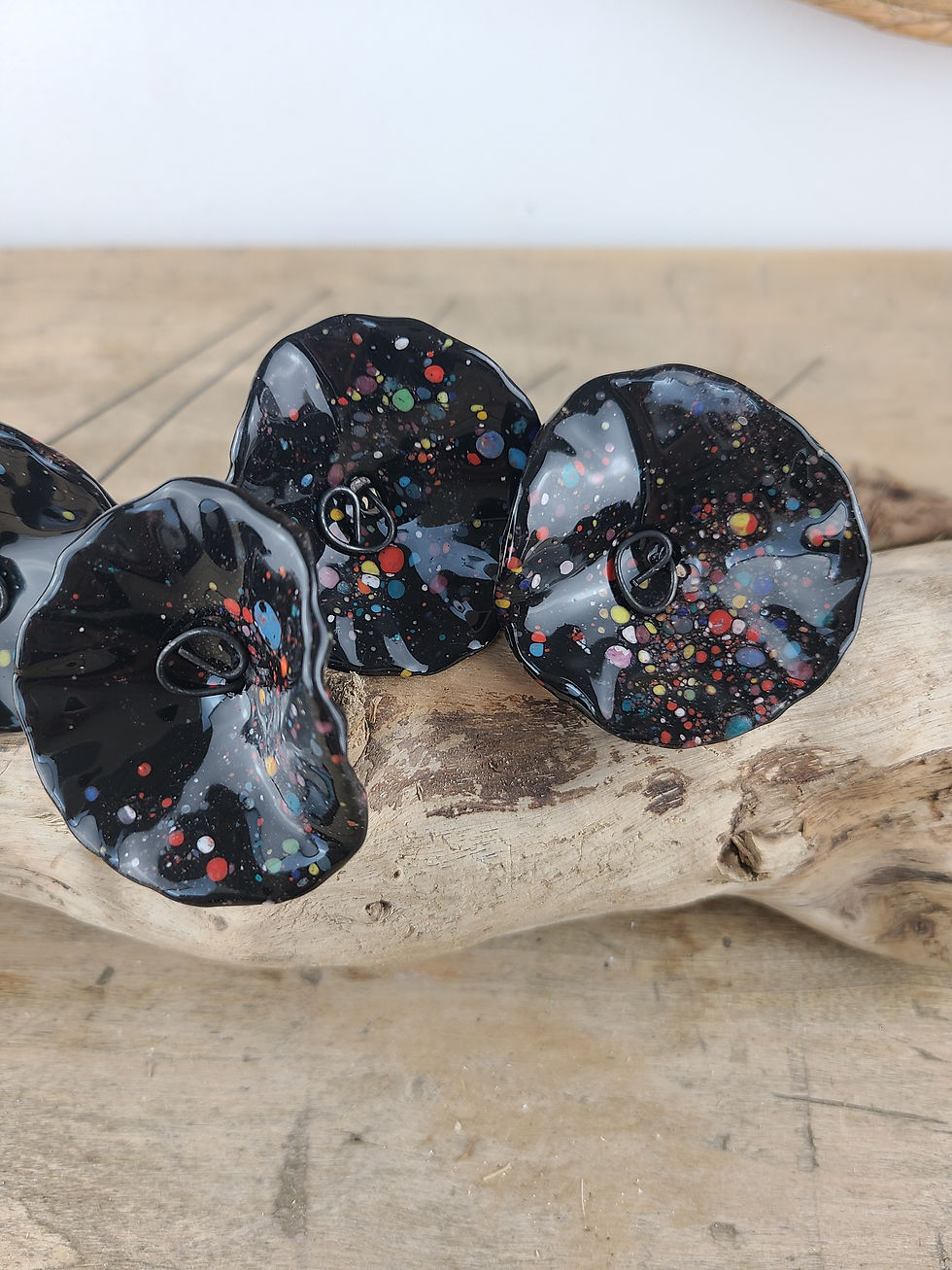 Miniature : Fleur noire mouchetée multicolore