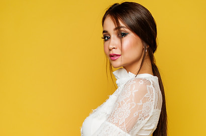 woman-standing-wearing-white-floral-lace