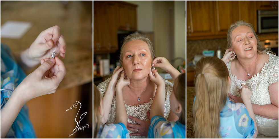 Rainy Day Wedding Photography Sarasota, Bride getting ready with Flower girls putting on earrings