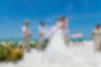 Sarasota Wedding Photographer bride and her father share a hug as he gives her away