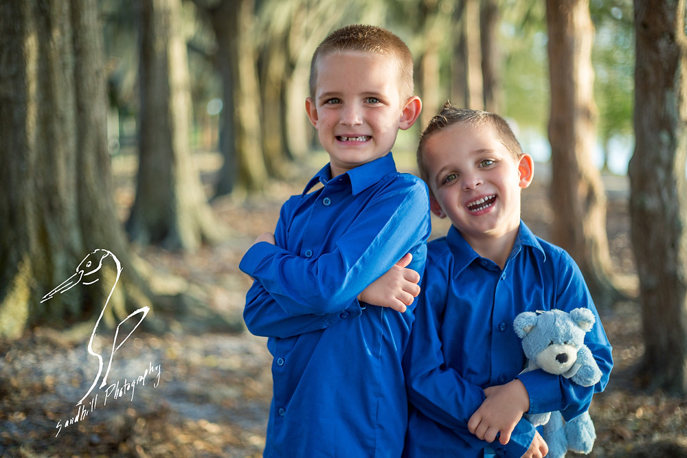 Bradenton Family Photographer | Top 10 tips for Pictures with Kids, brother laughing in the woods
