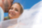 Sarasota Wedding Photographer bridal portrait with the brides veil blowing towards the camera