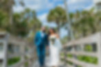 Longboat Key Wedding Photographer, bride and groom walk down the beach boardwalk at the Longboat Key Club