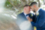 Sarasota LGBTQ Photographer, in a private moment, the grooms embrace and share their love