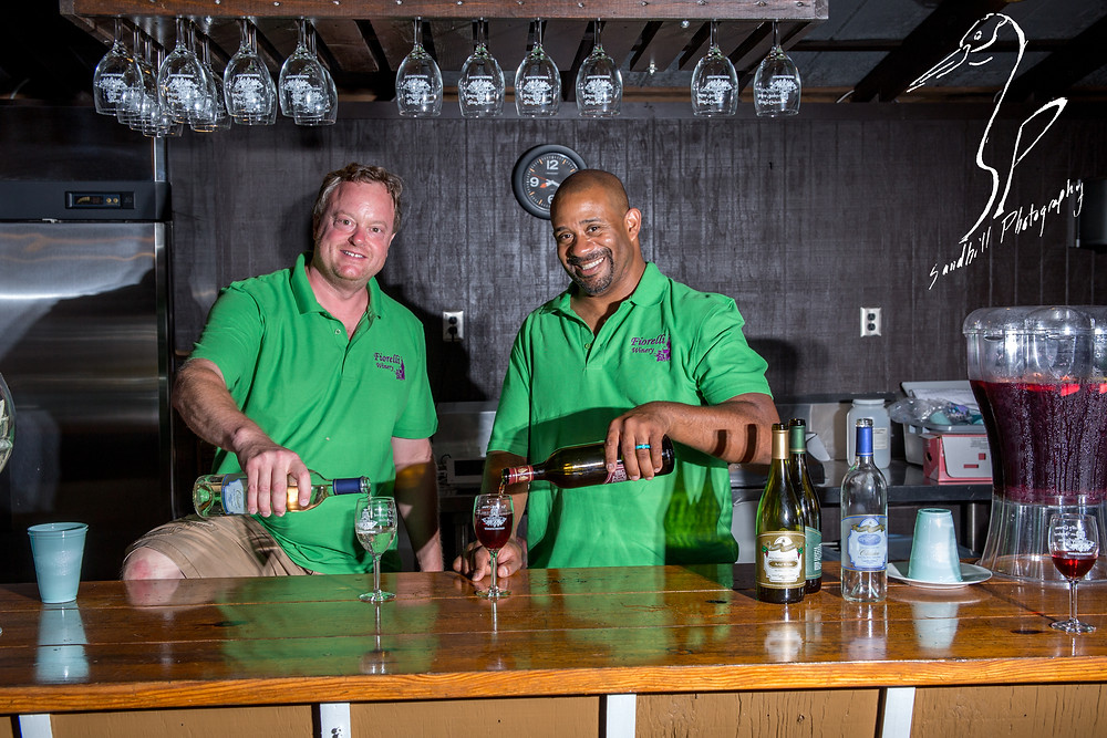 Fiorelli Winery & Vineyard wine 'n dine Bradenton bartenders pouring red wine white wine hanging glasses