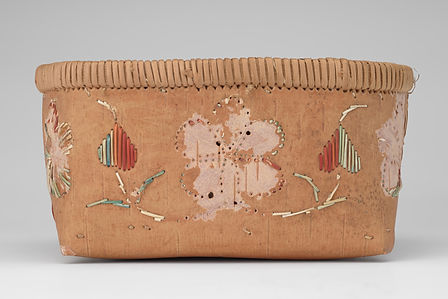 Red and green quillwork design on birchbark basket.