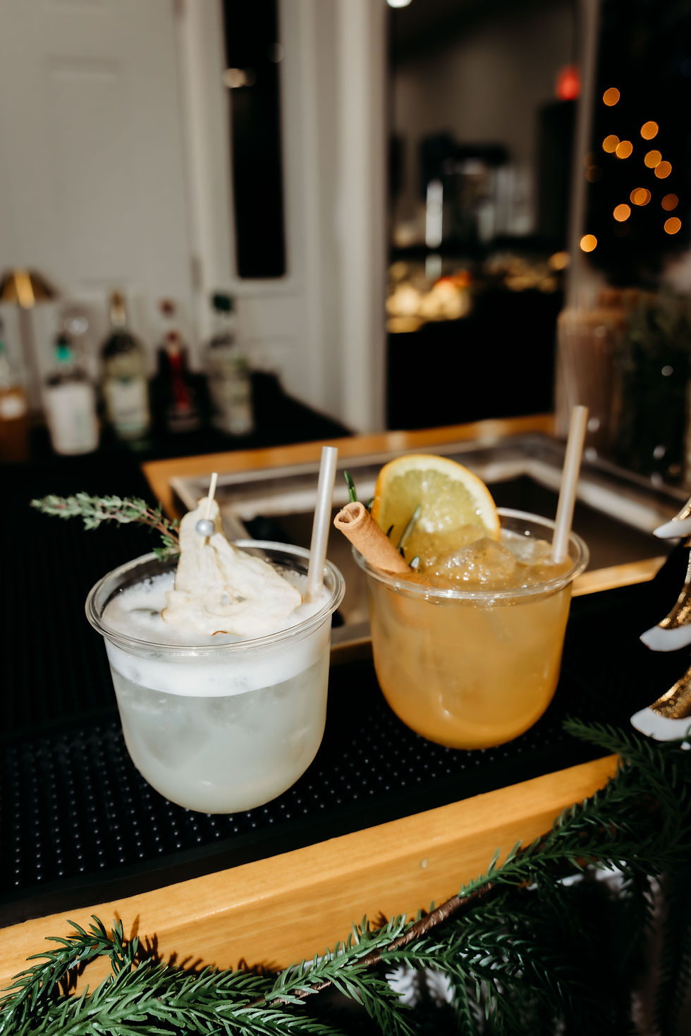 Festive mocktail presentation with seasonal garnish served by The Wandering Pour