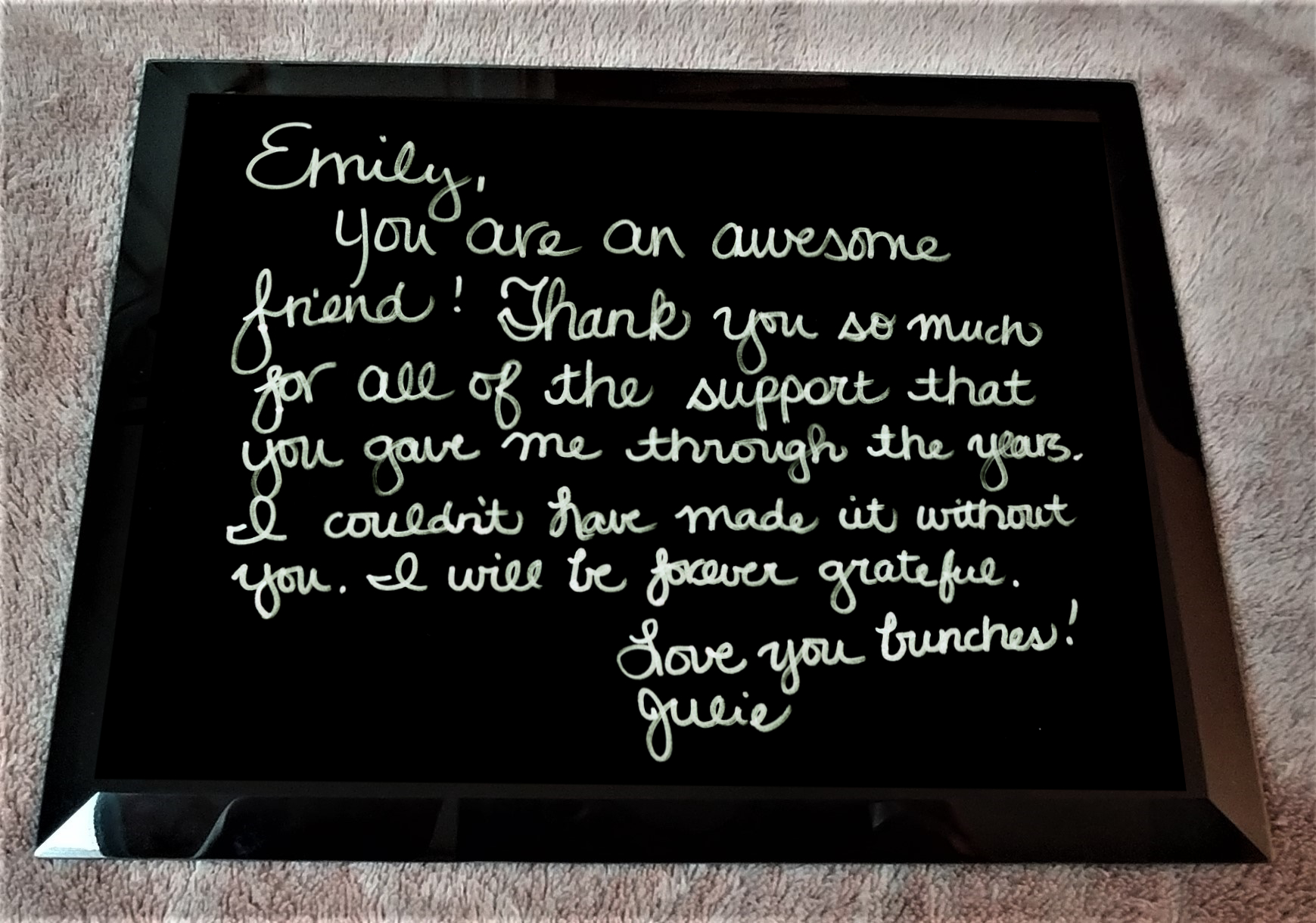 Handwriting on a black mirror