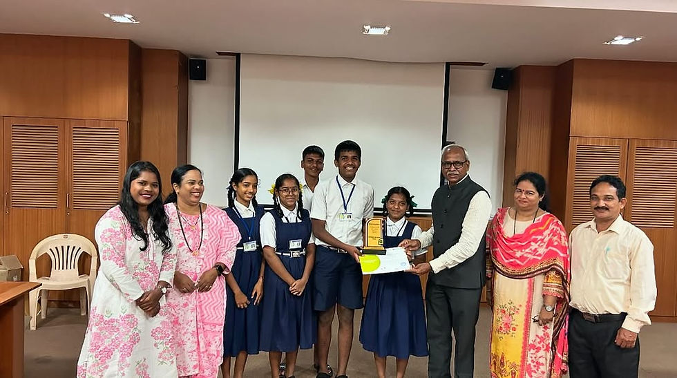 Dr. M. K. Janarthanam, Chairperson of Goa State Research Foundation, honors the winning schools of 2023-24, highlighting the significance of activity-based learning. Students and faculty proudly accept the award.