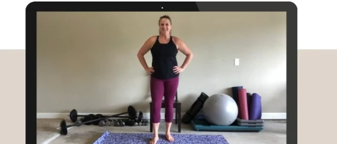 Gretchen Gegg does a demonstration of a side plank.