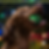 Thumbnail: Brown dog chewing green 'TUFF BALL' toy with festive Christmas lights.