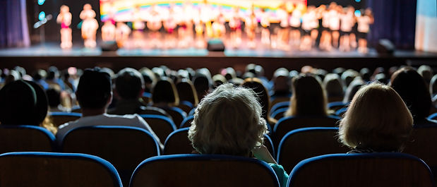 audience-sitting-theater-rows-watching-performance-stage-people-enjoying-concert-auditoriu