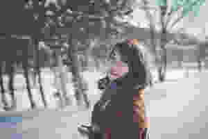 photography of a woman wearing gray scarf