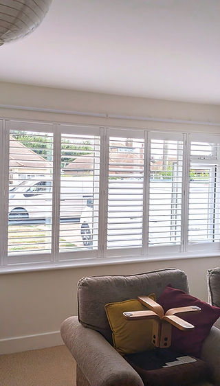 White plantaion shtters in a bay window in Romney Marsh, Kent