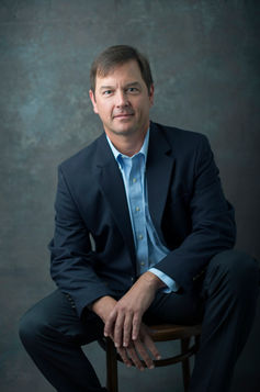 Men's studio portrait dark background Melody Smith Portrait Studio Petersburg VA serving Richmond Virginia