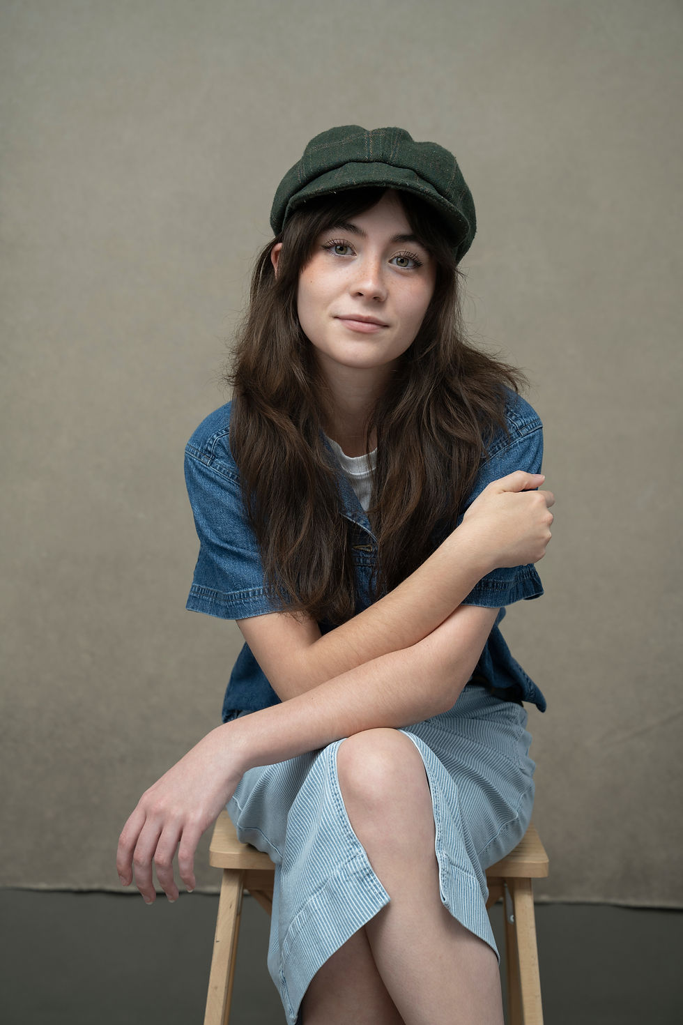 Women's portrait session in denim shirt and newsboy cap at Melody Smith Portrait, serving Petersburg, Richmond, and Colonial Heights Virginia