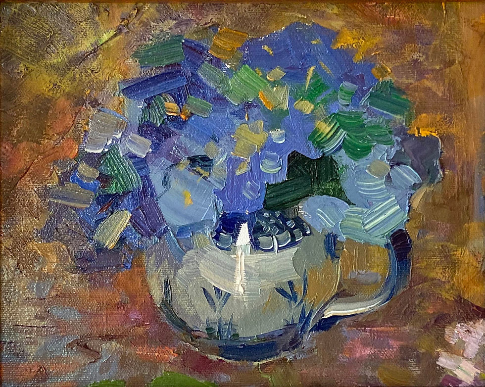 Blue hydrangeas in a teacup