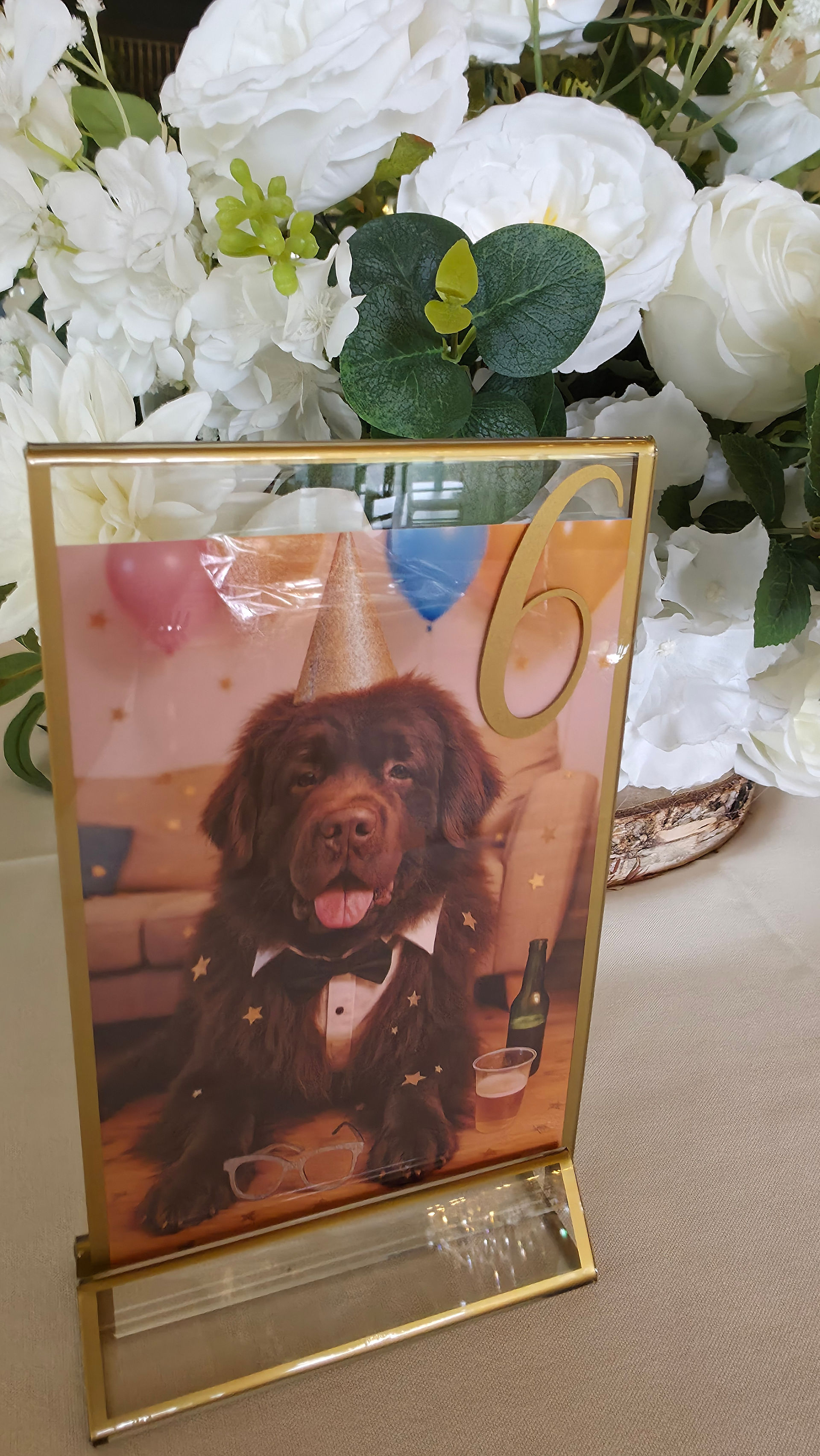 Creative wedding table name stationery featuring Newfoundland dog