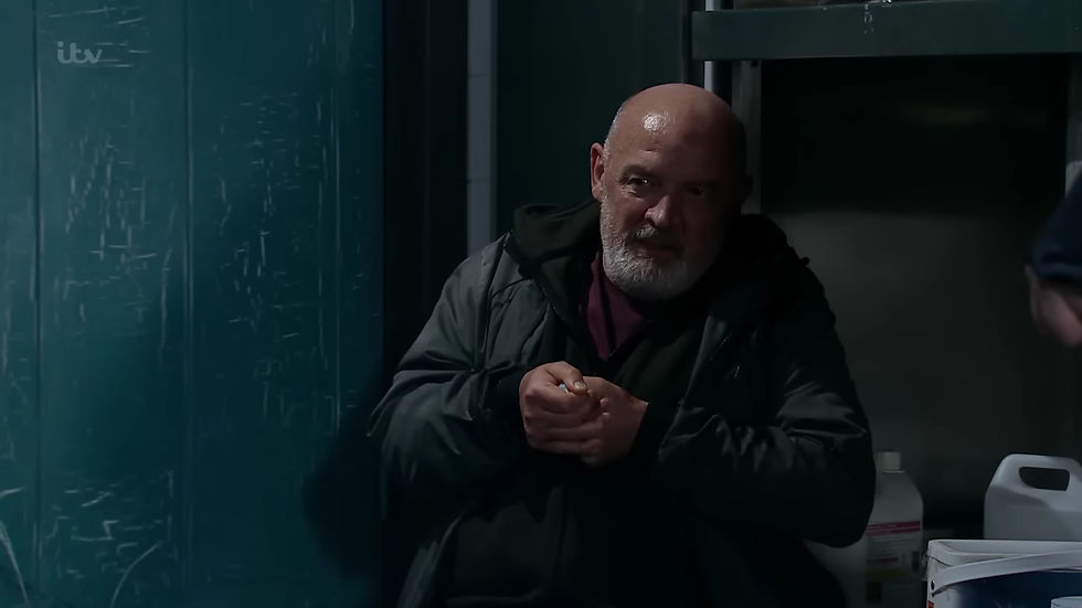 Pat Phelan with a knife in his chest