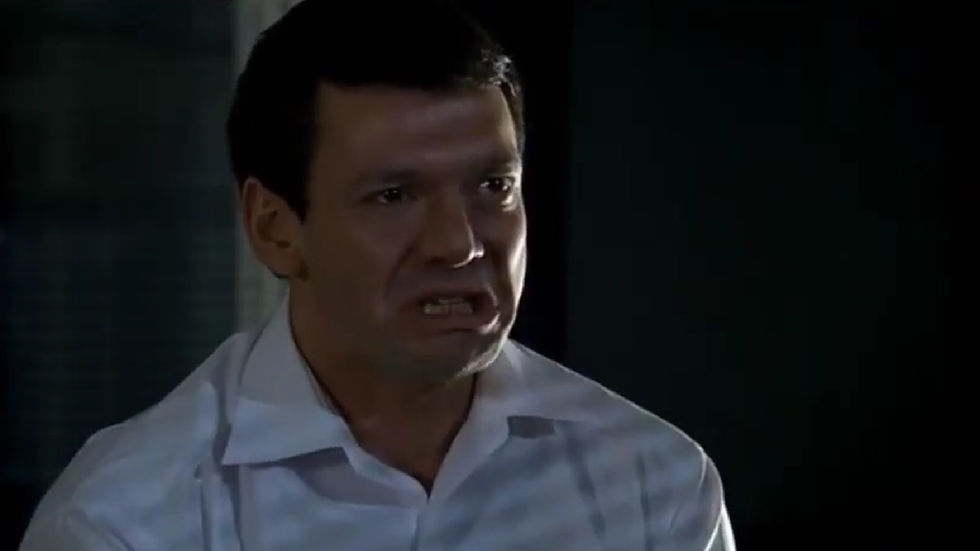 Tony Gordon looking upset whilst speaking in the factory