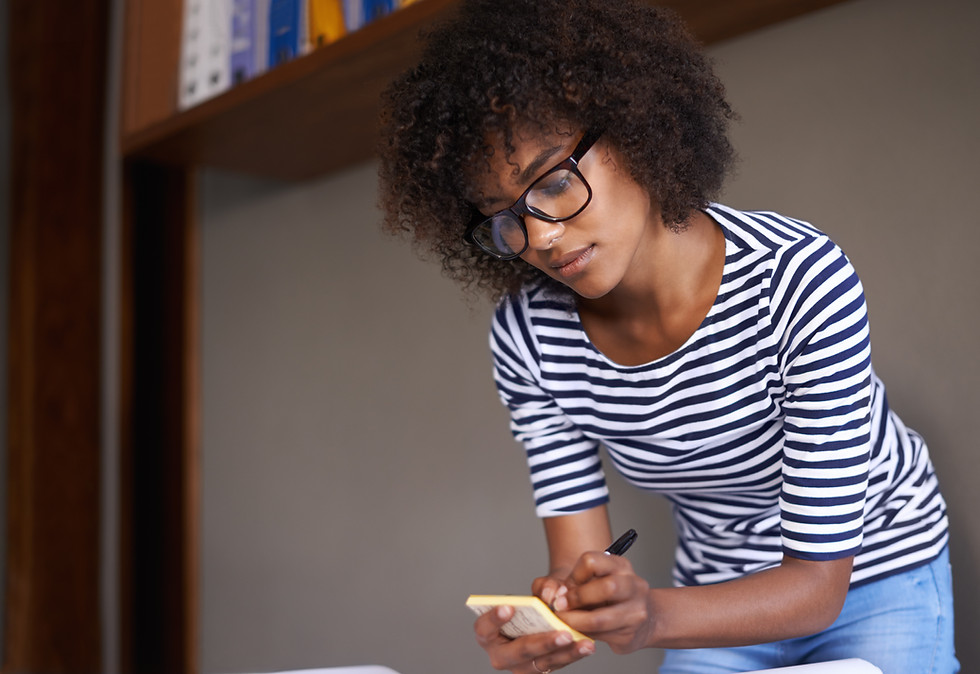 Young Woman Making Notes