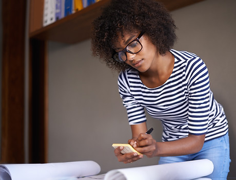 Young Woman Making Notes