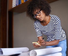 Young Woman Making Notes