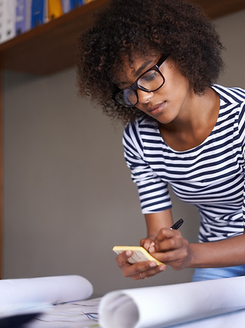 Young Woman Making Notes