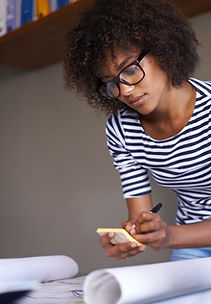 Young Woman Making Notes