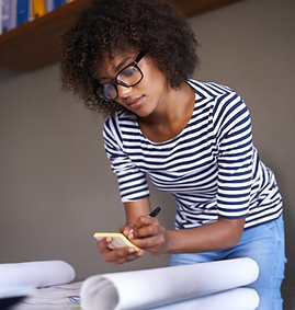 Young Woman Making Notes