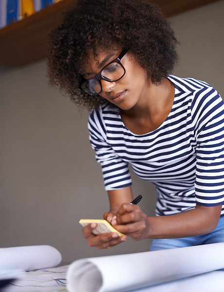 Young Woman Making Notes