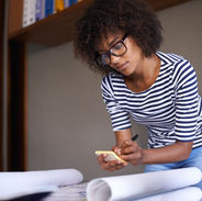 Young Woman Making Notes