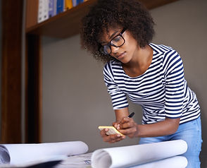 Young Woman Making Notes