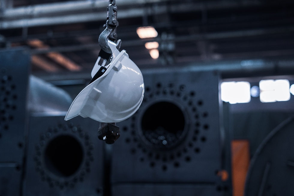 a safety helmet hangs on a hook