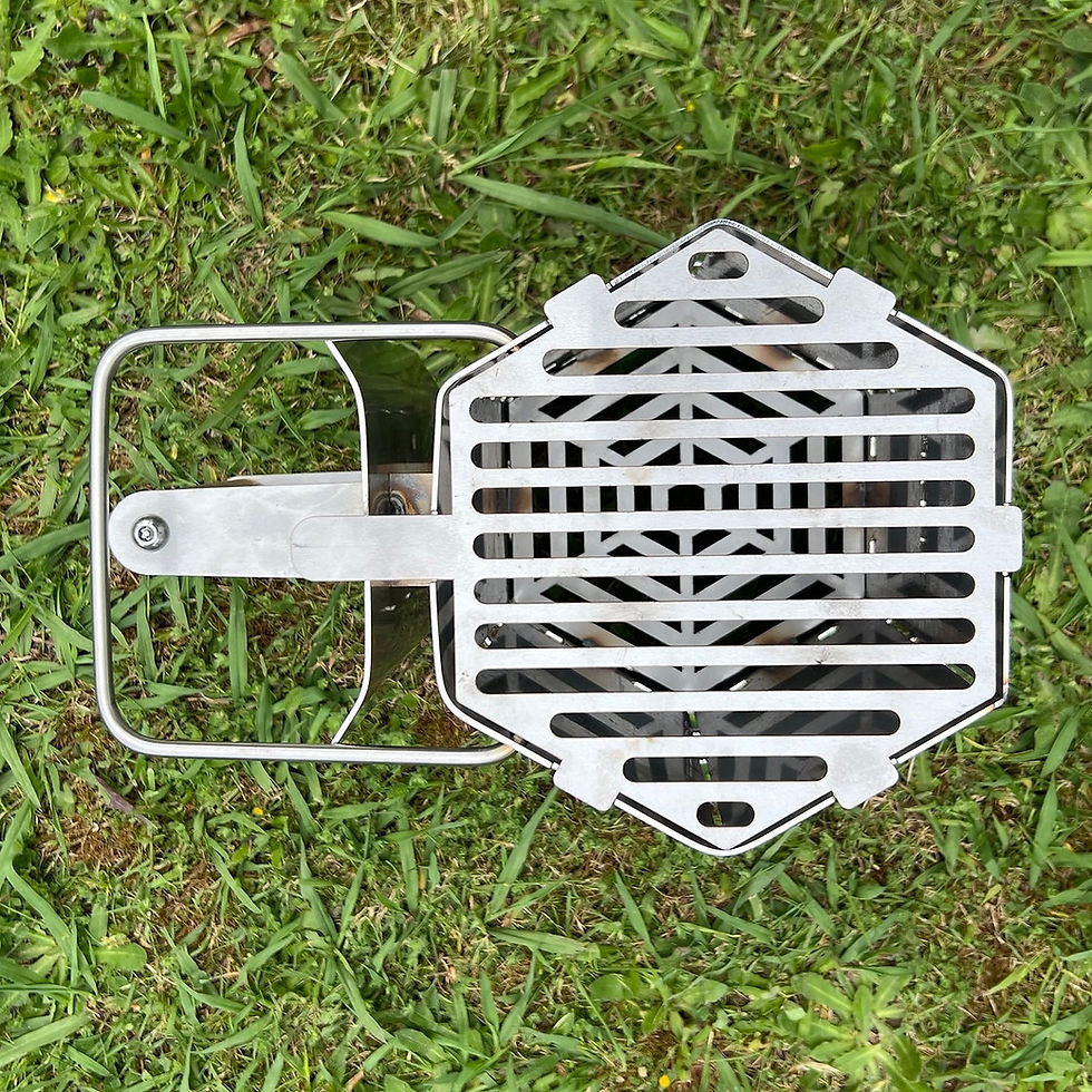 Thumbnail: top view of the grill on the chimney starter, used for grilling food direct over lit charcoal