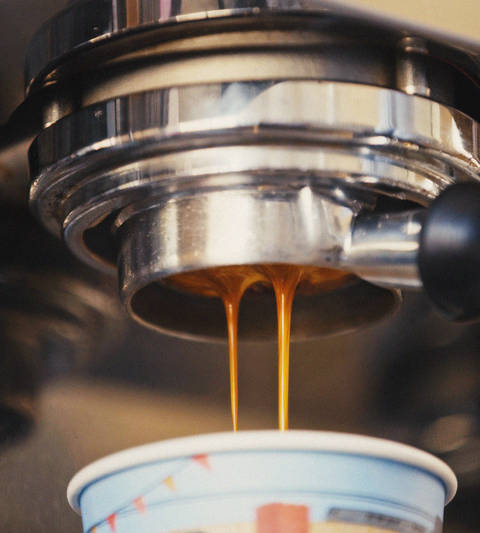 Close-up of coffee pouring from a filter machine at Charlie’s Coffee in St Albans