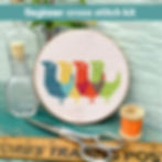A cross stitch kit featuring retro, mid-century modern birds. Available on Mid-CenturyMaude.com