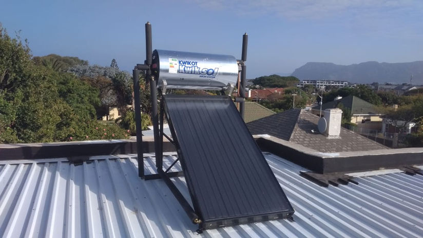 Solar geyser installed on a flat roof in Cape Town.