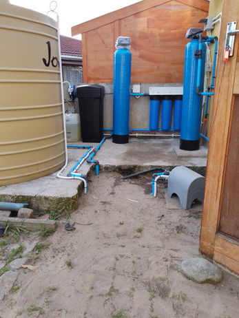 Installed residential water purification system with multi-stage filtration unit in Cape Town.
