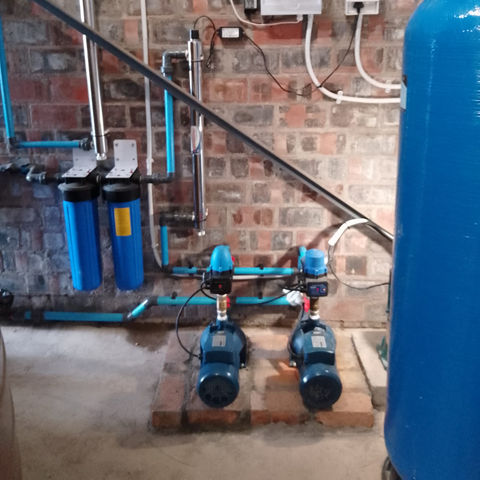 Pressure pump system installed at a Stellenbosch farm by The Water Solar Company to supply water to a greenhouse wet wall system.