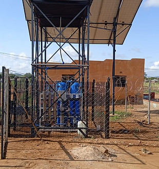 Complete solar reverse osmosis system with borehole and booster pumps supplying safe water to a village near Pretoria.