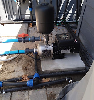 Solar-powered VSD booster pump setup for residential irrigation and household water use in Cape Town.