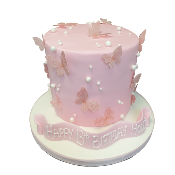 Bespoke celebration cake adorned with colorful butterfly decorations in Solihull, West Midlands.