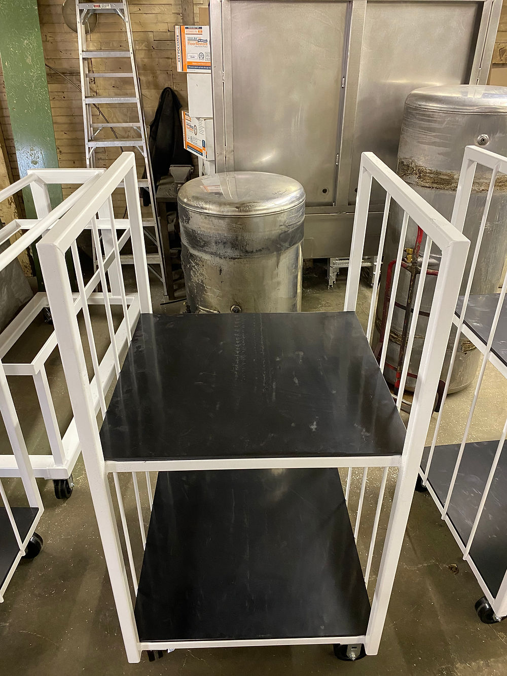Custom metal fabrication: white cart with shelves